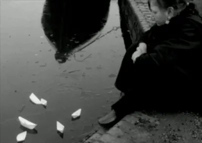 Woman at water's edge